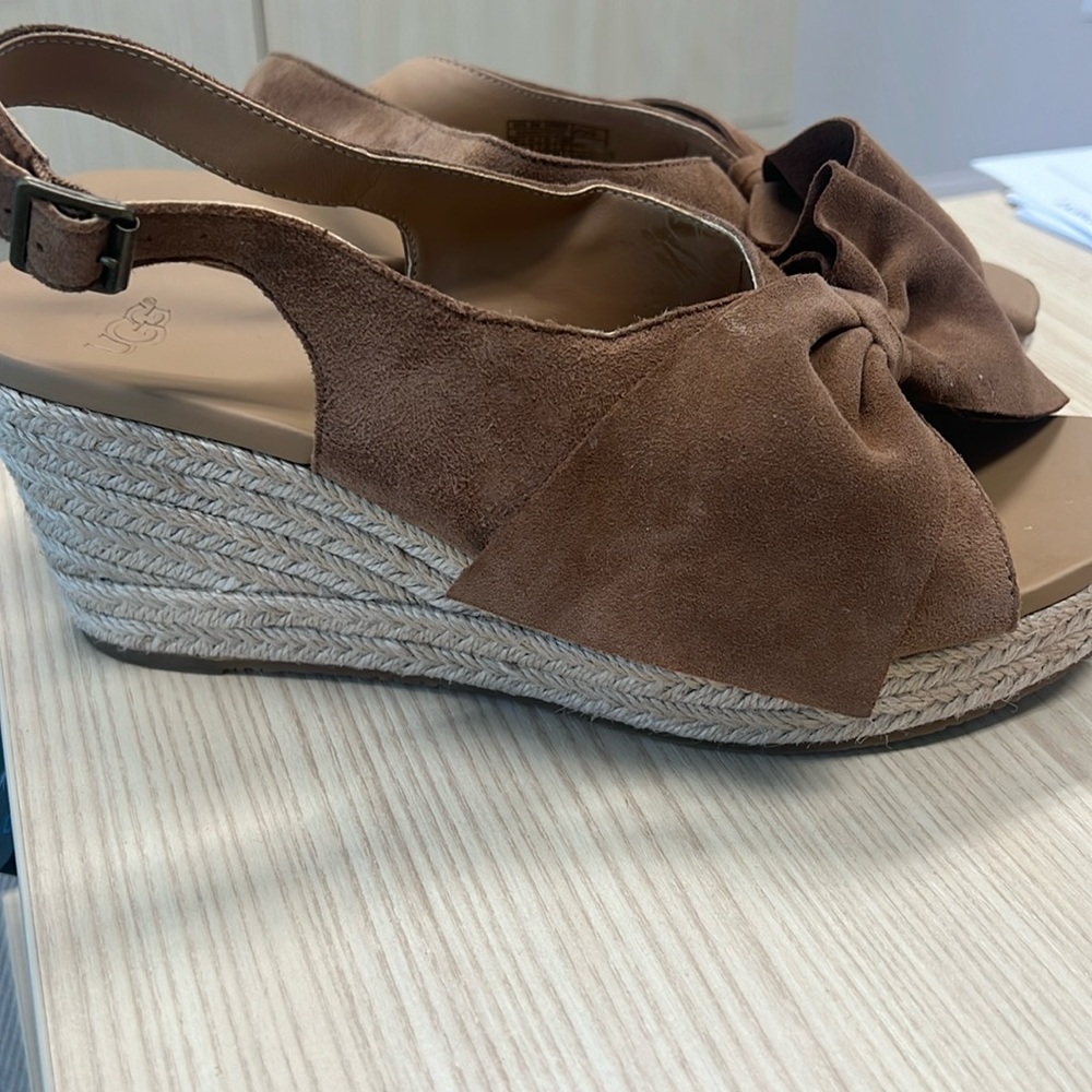UGG brown suede wedges with bow. Worn twice, great condition.
